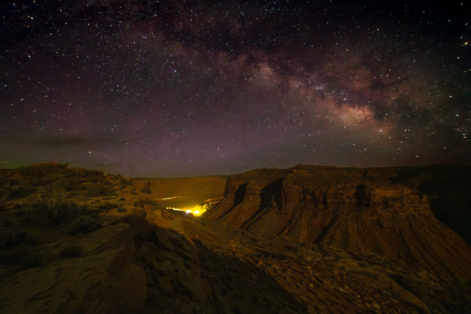The Milky Way over a canyon